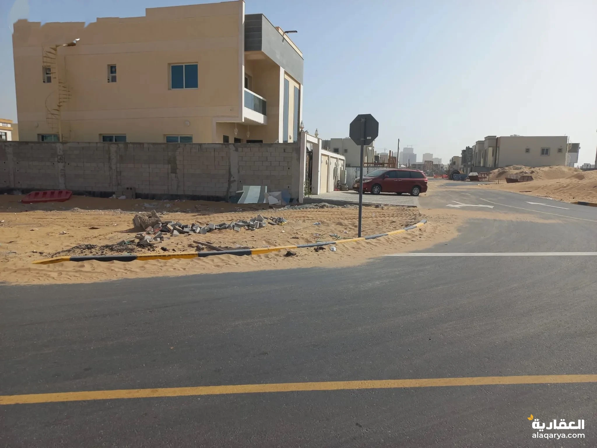 #ارض للبيع الزاهية سكنى زاوية شارعين وسط العمار شارع الشيخ محمد بن زايد