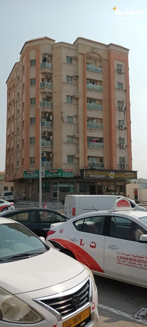 Apartment for rent in Al Bustan, Ajman, 3 rooms and a hall, a distinguished location on Saif Al Hamrani Street, close to Al Mina Street, opposite Rashid Driving School, employees next to all services